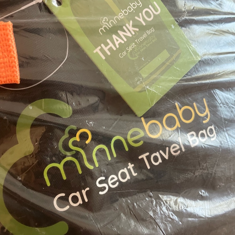New minnebaby car seat travel bag.